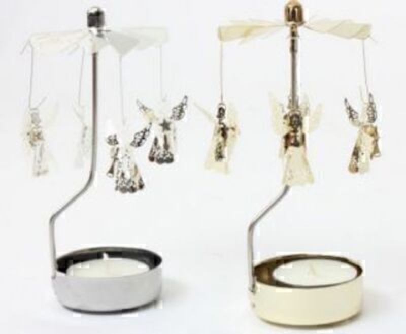 Metal Angel T-light Holder Gold Or Silver By Heaven Sen These small metal angel T-light holder come in a variety of gold or silver. When you light the candle the angels spin. Although small in size they are amazingly detailed pieces that can be placed anywhere around the house. These make a great addition to y